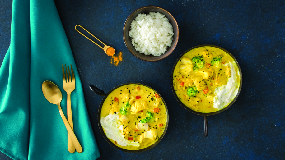 Wild Alaska pollock coconut curry with cucumber yogurt sauce